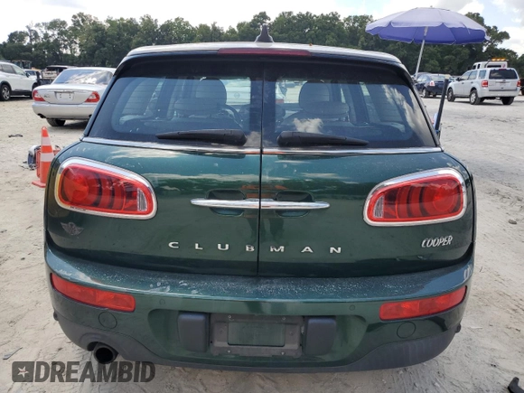 2016 MINI Clubman z VIN WMWLN5C5XG2E29275, wystawiony jako Copart lot #68162014 z przebiegiem 79 754 mil mil oraz Nie do naprawy. Historia ofert i sprzedaży dostępna na DreamBid. Obrazek 6.