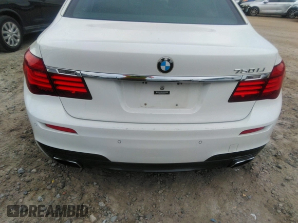 2015 BMW 7 Series 750Li with VIN WBAYE8C50FD781160, listed as a IAAI auction lot 41061232 with 154,496 mi miles. Bid and sale history available at carsss.com. Image 6.