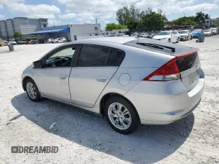 2010 Honda Insight EX with VIN JHMZE2H74AS032878, listed as a Copart auction lot 56230795 with 125,838 mi miles and Clean title. Bid and sale history available at DreamBid. Image 2.