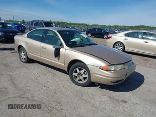 2003 Oldsmobile Alero GL1 z VIN 1G3NL52F23C287193, wystawiony jako IAAI lot #42179851 z przebiegiem 239 173 mil mil oraz . Historia ofert i sprzedaży dostępna na DreamBid. Obrazek 1.