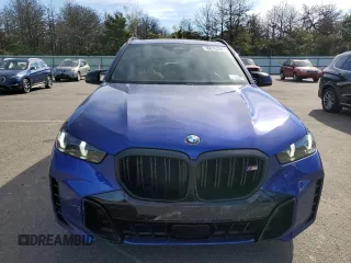 2024 BMW X5 M60i with VIN 5UX33EU07R9U78919, listed as a Copart auction lot 70676234 with 14,301 mi miles and Salvage Title. Bid and sale history available at carsss.com. Image 5.