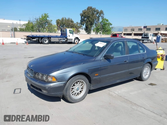 2000 BMW 5 Series 528iA with VIN WBADM634XYGU07427, listed as a IAAI auction lot 42085048 with 192,828 mi miles. Bid and sale history available at carsss.com. Image 6.