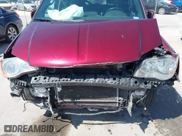 2017 Dodge Grand Caravan SXT with VIN 2C4RDGCG6HR629633, listed as a IAAI auction lot 41997303 with 128,898 mi miles and . Bid and sale history available at DreamBid. Image 6.