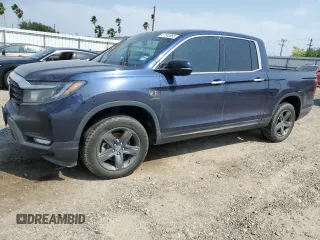 2023 Honda Ridgeline RTL-E with VIN 5FPYK3F74PB023755, listed as a Copart auction lot 51540665 with 26,304 mi miles and Salvage title. Bid and sale history available at DreamBid. Image 1.