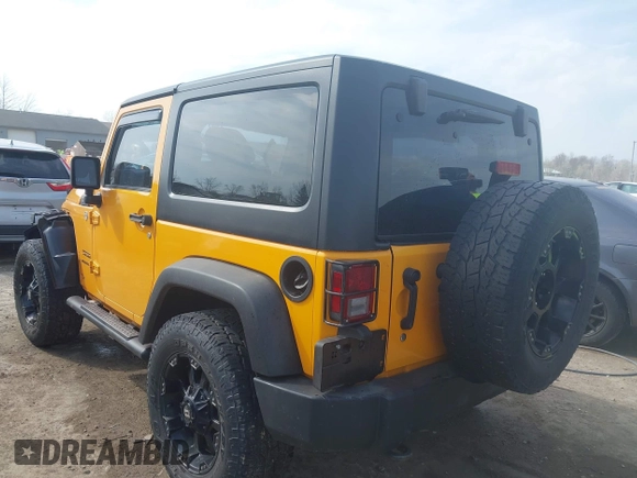 2012 Jeep Wrangler Sport with VIN 1C4AJWAG0CL128595, listed as a IAAI auction lot 42048590 with 133,085 mi miles and . Bid and sale history available at DreamBid. Image 3.