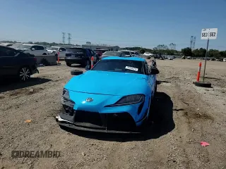 2021 Toyota Supra 2.0 with VIN WZ1DB2C04MW039858, listed as a Copart auction lot 70049874 with 10,586 mi miles and Salvage title. Bid and sale history available at DreamBid. Image 14.