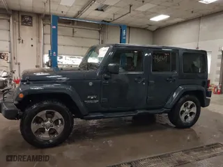 2018 Jeep Wrangler JK Unlimited Altitude with VIN 1C4BJWEG8JL809132, listed as a IAAI auction lot 41460564 with 114,363 mi miles. Bid and sale history available at carsss.com. Image 15.