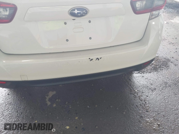 2022 Subaru Impreza with VIN 4S3GTAB65N3708540, listed as a IAAI auction lot 42353065 with 63,557 mi miles and . Bid and sale history available at DreamBid. Image 6.