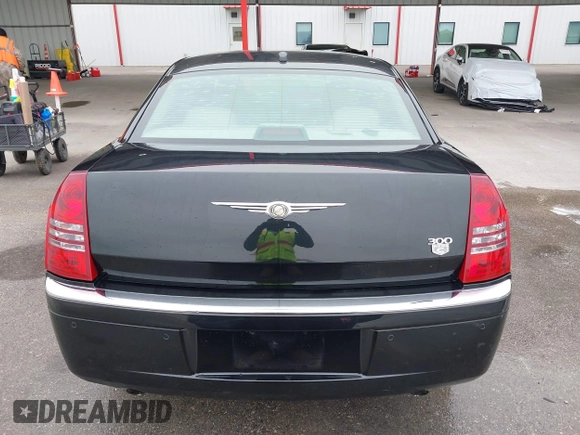 2005 Chrysler 300 with VIN 2C3AA63H45H674987, listed as a IAAI auction lot 41560730 with 101,659 mi miles. Bid and sale history available at carsss.com. Image 16.