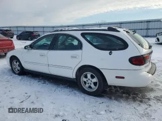 2005 Ford Taurus with VIN 1FAHP58255A219979, listed as a Copart auction lot 41699265 with 137,804 mi miles and Salvage title. Bid and sale history available at DreamBid. Image 2.