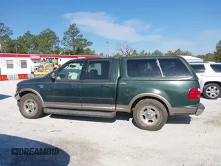 2003 Ford F-150 XLT with VIN 1FTRW07L53KA64064, listed as a IAAI auction lot 41697350 with 227,114 mi miles. Bid and sale history available at carsss.com. Image 14.