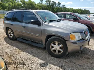 2005 GMC Envoy SLT z VIN 1GKDS13S652344365, wystawiony jako Copart lot #52745125 z przebiegiem 131 099 mil mil oraz Szkoda całkowita • Salvage title. Historia ofert i sprzedaży dostępna na DreamBid. Obrazek 4.