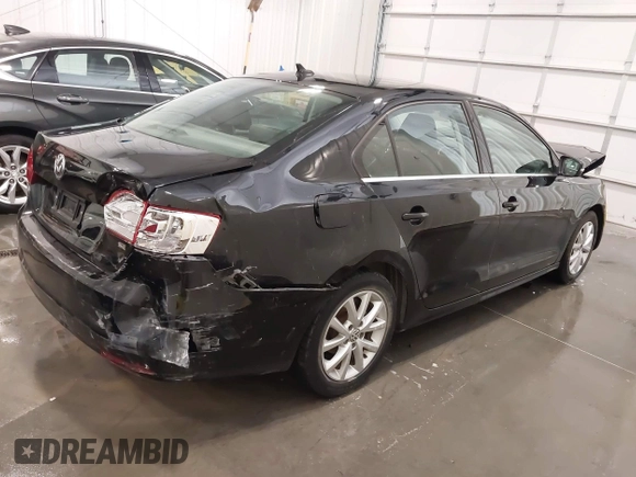 2014 Volkswagen Jetta SE with VIN 3VWD07AJ3EM437025, listed as a IAAI auction lot 42189870 with 96,530 mi miles and . Bid and sale history available at DreamBid. Image 4.