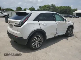 2020 Cadillac XT4 FWD Sport with VIN 1GYFZER49LF123830, listed as a Copart auction lot 55737985 with 98,871 mi miles and Salvage title. Bid and sale history available at DreamBid. Image 3.