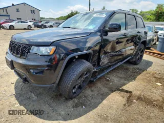 2019 Jeep Grand Cherokee Laredo E with VIN 1C4RJFAG1KC539375, listed as a Copart auction lot 64638465 with 66,688 mi miles and Salvage title. Bid and sale history available at DreamBid. Image 1.