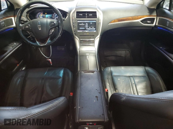 2016 Lincoln MKZ with VIN 3LN6L2JK4GR629425, listed as a Copart auction lot 52854645 with 127,981 mi miles and Salvage title. Bid and sale history available at DreamBid. Image 8.
