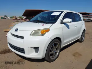 2011 Scion xD with VIN JTKKU4B49B1012447, listed as a IAAI auction lot 42026584 with 223,863 mi miles. Bid and sale history available at carsss.com. Image 2.