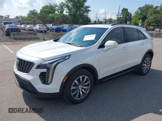2020 Cadillac XT4 FWD Sport with VIN 1GYFZER4XLF116224, listed as a IAAI auction lot 42759271 with 31,395 mi miles and . Bid and sale history available at DreamBid. Image 2.