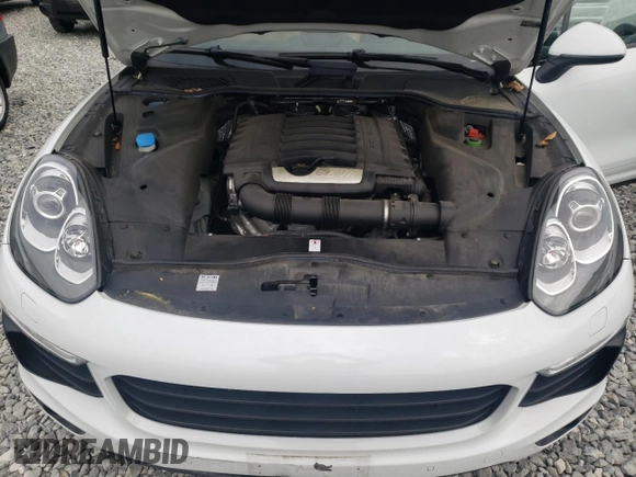 2017 Porsche Cayenne z VIN WP1AA2A23HKA87999, wystawiony jako Copart lot #57457705 z przebiegiem 27 231 mil mil oraz Szkoda całkowita • Salvage title. Historia ofert i sprzedaży dostępna na DreamBid. Obrazek 12.