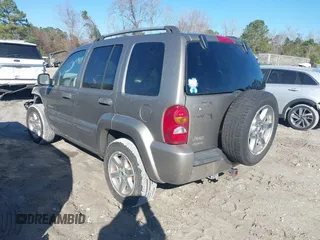 2003 Jeep Liberty Limited with VIN 1J4GL58K13W710254, listed as a IAAI auction lot 41574601 with 244,465 mi miles and . Bid and sale history available at carsss.com. Image 3.