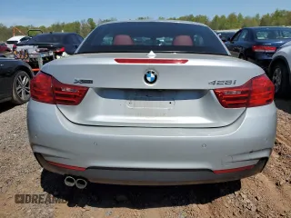 2014 BMW 4 Series 428i xDrive with VIN WBA3T1C58EP819710, listed as a Copart auction lot 54699235 with 196,856 mi miles and Salvage Title. Bid and sale history available at carsss.com. Image 6.