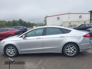 2016 Ford Fusion SE z VIN 3FA6P0H76GR385328, wystawiony jako IAAI lot #42408631 z przebiegiem 127 293 mil mil oraz . Historia ofert i sprzedaży dostępna na DreamBid. Obrazek 14.