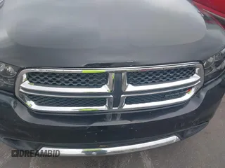 2012 Dodge Durango SXT with VIN 1C4RDJAG4CC314444, listed as a IAAI auction lot 42535630 with 205,494 mi miles and . Bid and sale history available at DreamBid. Image 6.
