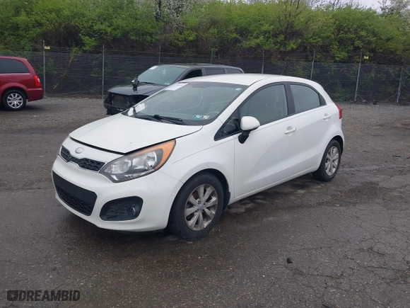 2013 Kia Rio SX with VIN KNADN5A34D6245263, listed as a IAAI auction lot 41976166 with 101,438 mi miles. Bid and sale history available at carsss.com. Image 2.