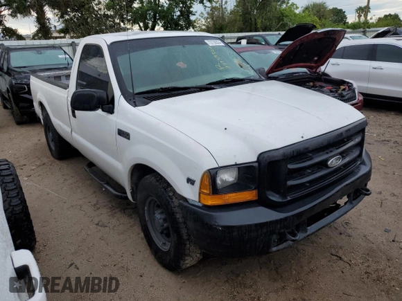 2000 Ford Super Duty F-250 XL with VIN 1FTNF20L8YEA71116, listed as a Copart auction lot 73739324 with 303,338 mi miles and Salvage Title. Bid and sale history available at carsss.com. Image 4.