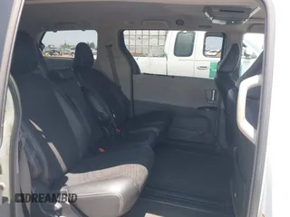2014 Toyota Sienna SE z VIN 5TDXK3DC0ES515325, wystawiony jako IAAI lot #42520007 z przebiegiem 155 649 mil mil oraz . Historia ofert i sprzedaży dostępna na DreamBid. Obrazek 8.