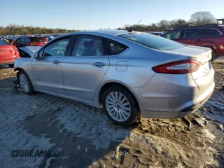 2013 Ford Fusion SE Hybrid with VIN 3FA6P0LUXDR244609, listed as a Copart auction lot 88335515 with Not Provided miles and Salvage Title. Bid and sale history available at DreamBid. Image 2.