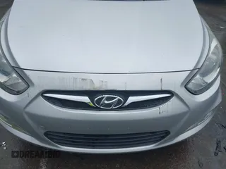 2012 Hyundai Accent SE z VIN KMHCU5AE0CU054285, wystawiony jako IAAI lot #42170678 z przebiegiem 92 172 mil mil oraz . Historia ofert i sprzedaży dostępna na DreamBid. Obrazek 6.
