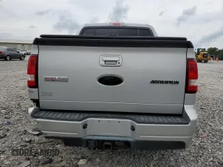 2010 Ford Explorer Sport Trac with VIN 1FMEU2D86AUA04257, listed as a Copart auction lot 60132315 with 116,941 mi miles and Salvage title. Bid and sale history available at DreamBid. Image 6.