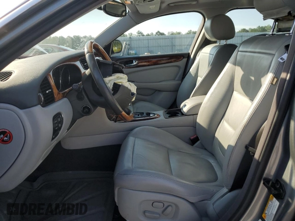 2005 Jaguar XJ with VIN SAJWA79C65SG45989, listed as a Copart auction lot 65357044 with 103,587 mi miles and Salvage Title. Bid and sale history available at carsss.com. Image 7.