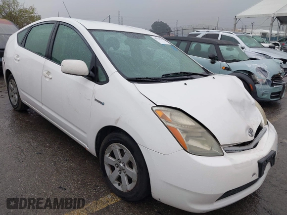 2007 Toyota Prius z VIN JTDKB20U177622142, wystawiony jako IAAI lot #41720920 z przebiegiem 140 665 mil mil oraz . Historia ofert i sprzedaży dostępna na DreamBid. Obrazek 1.
