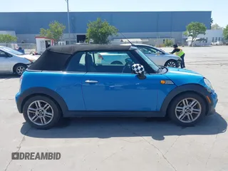 2014 MINI Convertible с VIN WMWZN3C55ET569656, выставлен на аукционе IAAI как лот 42105348 с пробегом 87 671 миль миль и . История ставок и продаж доступна на DreamBid. Изображение 13.
