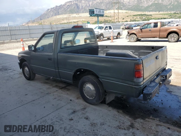 1994 Isuzu Pickup S z VIN JAACL11L2R7221226, wystawiony jako Copart lot #59027295 z przebiegiem 129 494 mil mil oraz Tytuł czysty. Historia ofert i sprzedaży dostępna na DreamBid. Obrazek 2.
