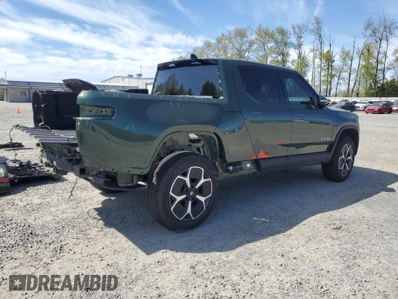 2023 Rivian R1T Adventure with VIN 7FCTGAAA1PN020979, listed as a Copart auction lot 52574025 with 0 mi miles and Salvage Title. Bid and sale history available at carsss.com. Image 3.