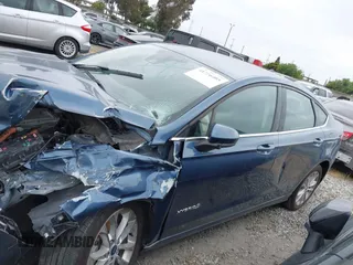 2019 Ford Fusion Hybrid SE with VIN 3FA6P0LU2KR148731, listed as a IAAI auction lot 41776405 with 1 mi miles. Bid and sale history available at carsss.com. Image 15.