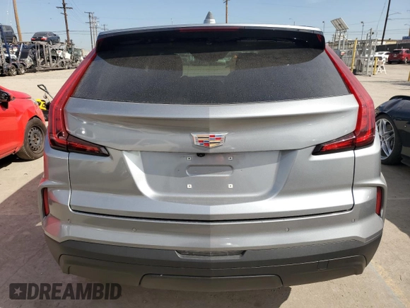 2024 Cadillac XT4 AWD Luxury with VIN 1GYFZBR40RF150020, listed as a Copart auction lot 46184565 with 9,188 mi miles and Salvage Title. Bid and sale history available at carsss.com. Image 6.