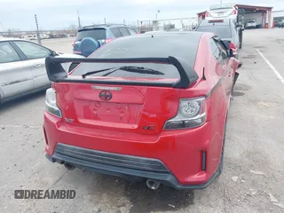 2016 Scion tC with VIN JTKJF5C74GJ026588, listed as a IAAI auction lot 41582253 with 74,023 mi miles. Bid and sale history available at carsss.com. Image 16.