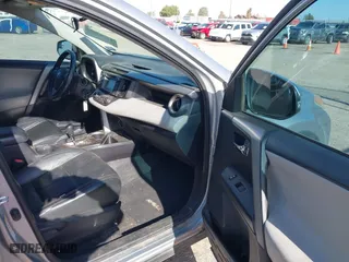 2016 Toyota RAV4 XLE with VIN 2T3WFREV1GW310309, listed as a IAAI auction lot 41993270 with 200,289 mi miles. Bid and sale history available at carsss.com. Image 5.