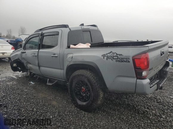 2021 Toyota Tacoma SR with VIN 3TMCZ5AN0MM395357, listed as a Copart auction lot 87086684 with 48,664 mi miles and Salvage title. Bid and sale history available at DreamBid. Image 2.