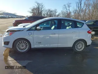 2016 Ford C-Max SEL z VIN 1FADP5CU2GL118381, wystawiony jako IAAI lot #41516426 z przebiegiem 220 361 mil mil oraz . Historia ofert i sprzedaży dostępna na DreamBid. Obrazek 14.