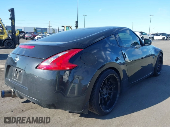 2016 Nissan 370Z with VIN JN1AZ4EH1GM933265, listed as a IAAI auction lot 41831484 with 98,193 mi miles. Bid and sale history available at carsss.com. Image 4.