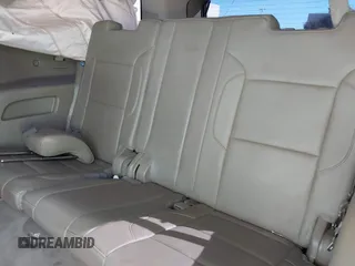 2015 Chevrolet Suburban LT z VIN 1GNSCJKC1FR608117, wystawiony jako IAAI lot #41641560 z przebiegiem 163 770 mil mil oraz . Historia ofert i sprzedaży dostępna na DreamBid. Obrazek 18.
