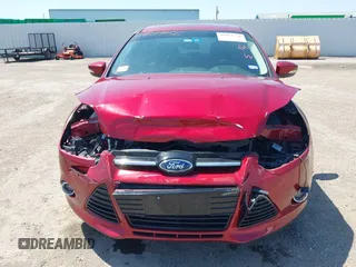 2013 Ford Focus Titanium with VIN 1FADP3J23DL334161, listed as a IAAI auction lot 41987758 with 117,665 mi miles and . Bid and sale history available at carsss.com. Image 6.