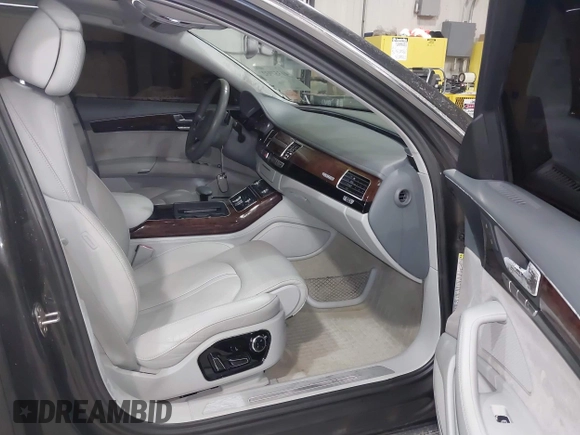 2012 Audi A8 z VIN WAURVAFD6CN014546, wystawiony jako IAAI lot #41357932 z przebiegiem 93 516 mil mil oraz . Historia ofert i sprzedaży dostępna na DreamBid. Obrazek 5.