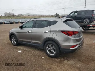 2017 Hyundai Santa Fe 2.4L z VIN 5NMZUDLB7HH030253, wystawiony jako Copart lot #51302445 z przebiegiem 136 074 mil mil oraz Szkoda całkowita • Salvage title. Historia ofert i sprzedaży dostępna na DreamBid. Obrazek 2.