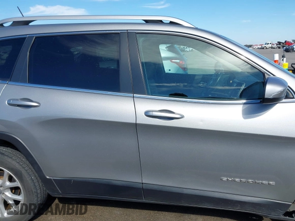 2015 Jeep Cherokee Latitude with VIN 1C4PJLCB8FW620336, listed as a IAAI auction lot 41634997 with 130,335 mi miles. Bid and sale history available at carsss.com. Image 14.